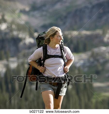backpackers hiking through the wilderness View Large Photo Image Stock Image - backpackers hiking through the wilderness. Fotosearch