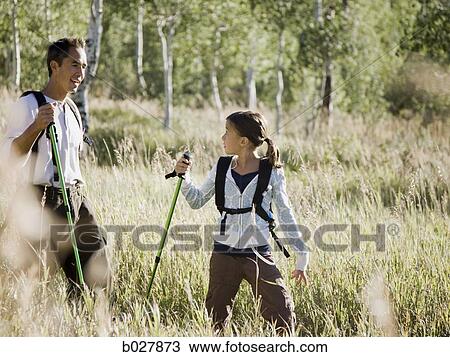 backpackers hiking through the wilderness View Large Photo Image Stock Image - backpackers hiking through the wilderness. Fotosearch