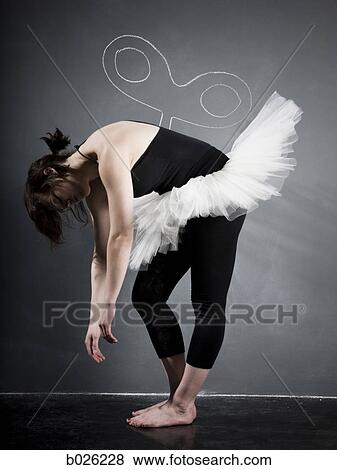 ballerina against a blackboard View Large Photo Image Stock Photo - ballerina against a blackboard. Fotosearch