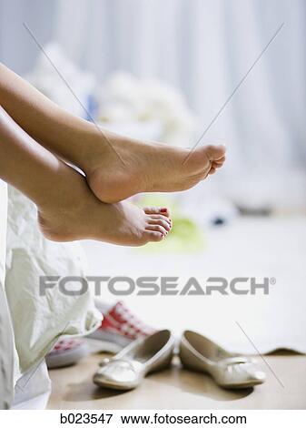 bare feet hanging off the bed View Large Photo Image Stock Photo - bare feet hanging off the bed. Fotosearch