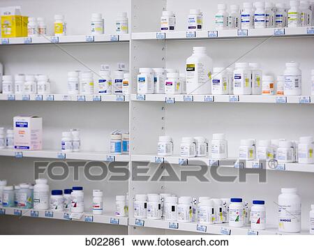 bottles on the shelves at a pharmacy View Large Photo Image Stock Image - bottles on the shelves at a pharmacy. Fotosearch