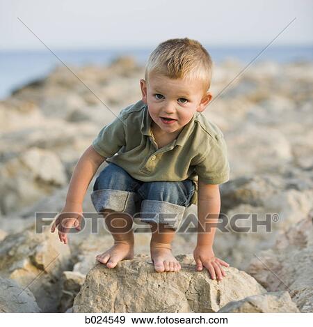 boy at the beach View Large Photo Image Stock Photo - boy at the beach. Fotosearch