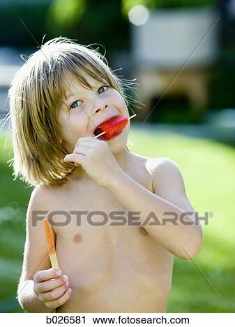 boy eating a popsicle View Large Photo Image Stock Image - boy eating a popsicle. Fotosearch