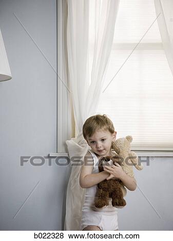 boy holding his teddy bears View Large Photo Image Stock Photo - boy holding his teddy bears. Fotosearch