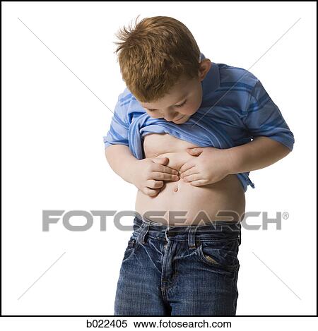 boy looking at his belly button View Large Photo Image Stock Photography - boy looking at his belly button. Fotosearch