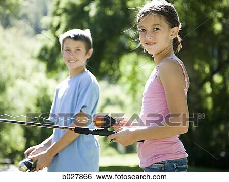 Stock Photograph - brother and sister fishing. Fotosearch