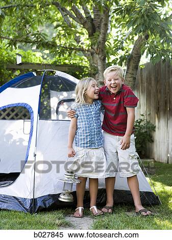 brother and sister in the backyard with their tent View Large Photo Image Stock Photography - brother and sister in the backyard with their tent. Fotosearch