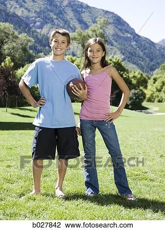 brother and sister with a football View Large Photo Image Stock Image - brother and sister with a football. Fotosearch