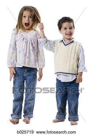 brother pulling his sister's hair View Large Photo Image Stock Photo - brother pulling his sister's hair. Fotosearch