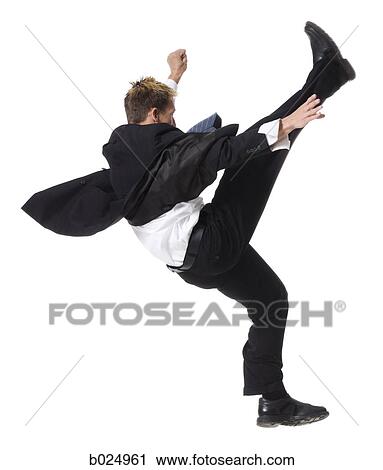 businessman doing a karate kick View Large Photo Image Stock Image - businessman doing a karate kick. Fotosearch