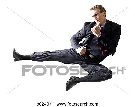 businessman doing a karate kick View Large Photo Image Stock Image - businessman doing a karate kick. Fotosearch