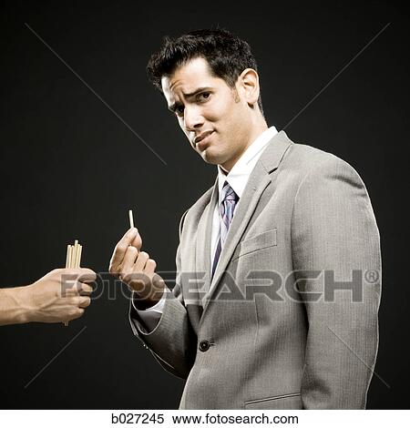 businessman drawing straws View Large Photo Image Stock Photography - businessman drawing straws. Fotosearch