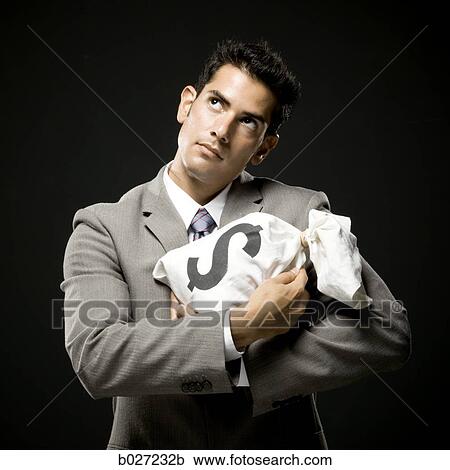 businessman holding a bag of money like a baby View Large Photo Image Stock Image - businessman holding a bag of money like a baby. Fotosearch