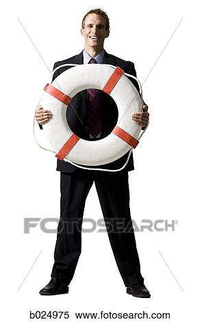 businessman holding a life preserver View Large Photo Image Stock Photography - businessman holding a life preserver. Fotosearch