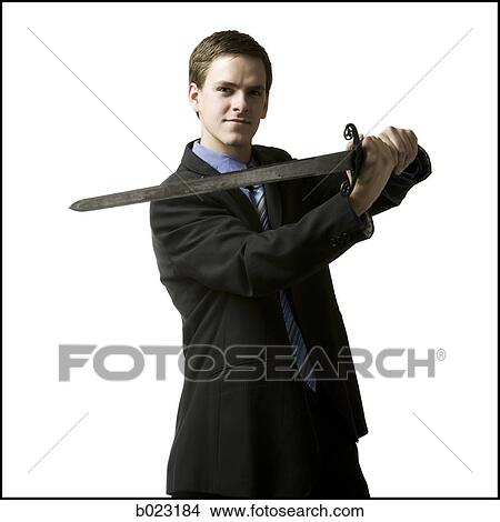 businessman holding a sword View Large Photo Image Picture - businessman holding a sword. Fotosearch