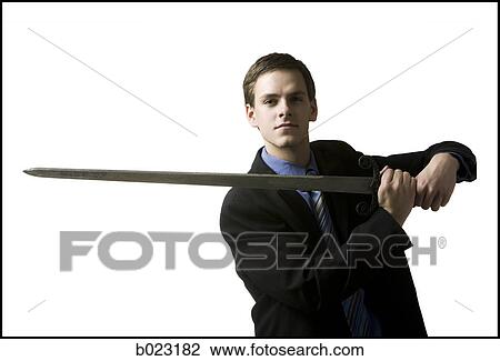 businessman holding a sword View Large Photo Image Stock Image - businessman holding a sword. Fotosearch