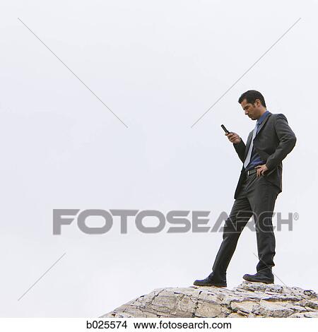 businessman in the wilderness View Large Photo Image Picture - businessman in the wilderness. Fotosearch