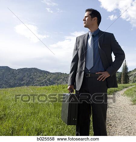 businessman in the wilderness View Large Photo Image Stock Photo - businessman in the wilderness. Fotosearch