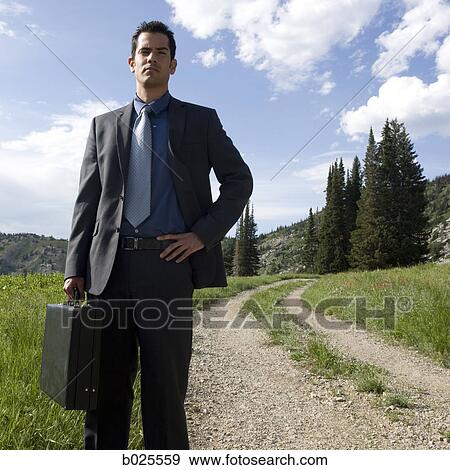 businessman in the wilderness View Large Photo Image Stock Photo - businessman in the wilderness. Fotosearch
