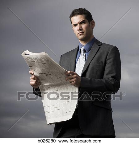 businessman reading a newspaper View Large Photo Image Stock Image - businessman reading a newspaper. Fotosearch