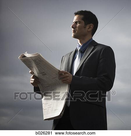 businessman reading a newspaper View Large Photo Image Stock Image - businessman reading a newspaper. Fotosearch