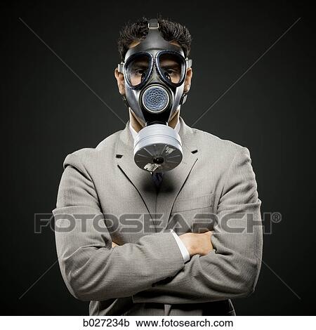 businessman wearing a gas mask View Large Photo Image Stock Image - businessman wearing a gas mask. Fotosearch