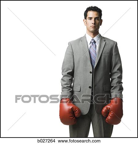 businessman wearing boxing gloves View Large Photo Image Picture - businessman wearing boxing gloves. Fotosearch