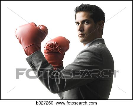 businessman wearing boxing gloves View Large Photo Image Stock Image - businessman wearing boxing gloves. Fotosearch