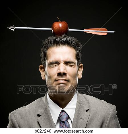 businessman with an apple on his head that has been shot with an arrow View Large Photo Image Stock Image - businessman with an apple on his head that has been shot with an arrow. Fotosearch
