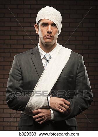 businessman with bandages on View Large Photo Image Stock Image - businessman with bandages on. Fotosearch
