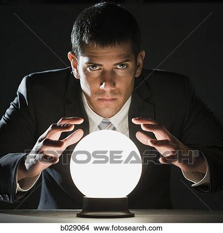 businessman with crystal ball View Large Photo Image Picture - businessman with crystal ball. Fotosearch