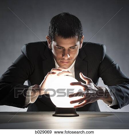 businessman with crystal ball View Large Photo Image Stock Photo - businessman with crystal ball. Fotosearch