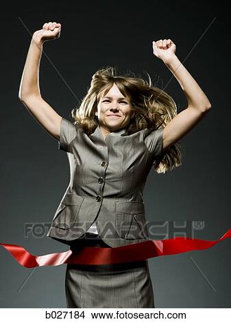 businesswoman crossing the finish line View Large Photo Image Picture - businesswoman crossing the finish line. Fotosearch