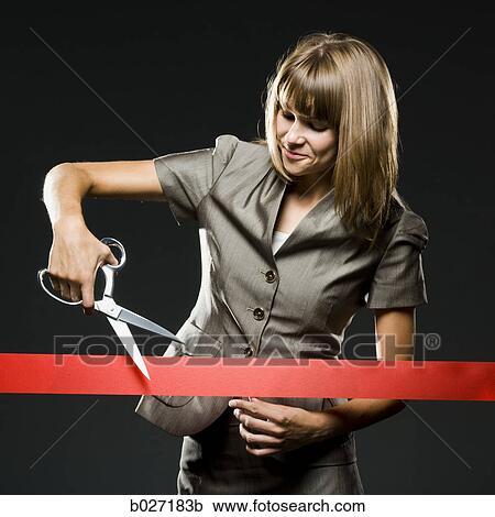 businesswoman cutting a red ribbon View Large Photo Image Stock Image - businesswoman cutting a red ribbon. Fotosearch
