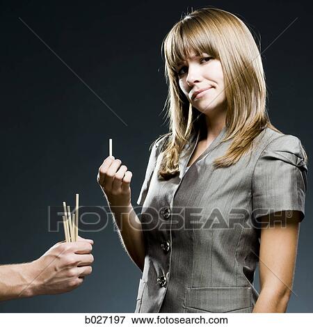 Stock Photo - businesswoman drawing straws. Fotosearch