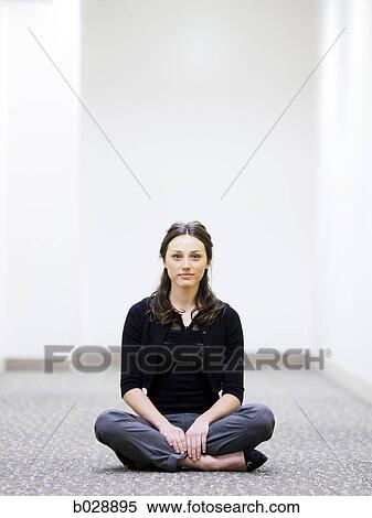 businesswoman sitting cross-legged on the floor View Large Photo Image Stock Photography - businesswoman sitting cross-legged on the floor. Fotosearch