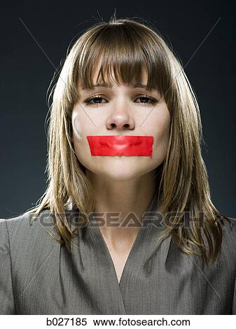 businesswoman with red tape over her mouth View Large Photo Image Stock Photography - businesswoman with red tape over her mouth. Fotosearch