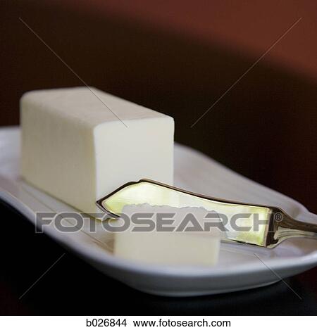Picture - butter on a butter dish. Fotosearch