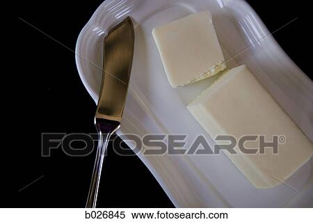 Stock Photography - butter on a butter dish. Fotosearch