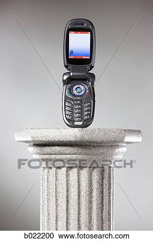 cell phone on a pedestal View Large Photo Image Stock Image - cell phone on a pedestal. Fotosearch