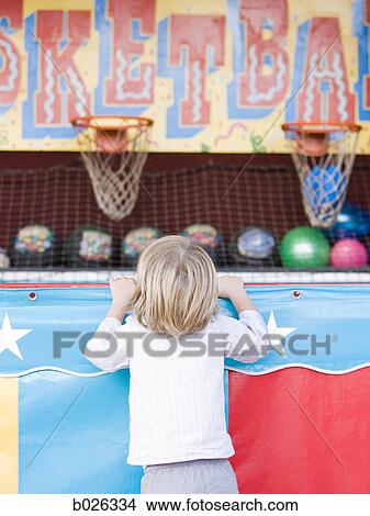 child at a carnival game View Large Photo Image Picture - child at a carnival game. Fotosearch