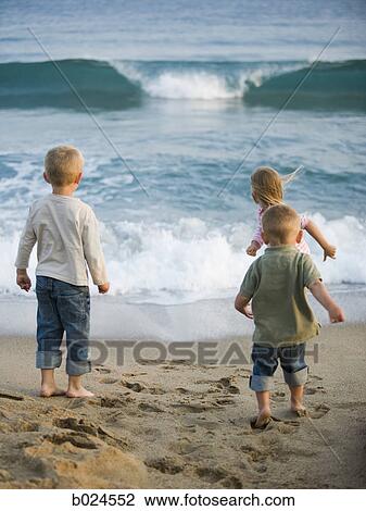 children at the beach View Large Photo Image Stock Image - children at the beach. Fotosearch