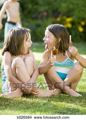 children eating popsicles View Large Photo Image Picture - children eating popsicles. Fotosearch
