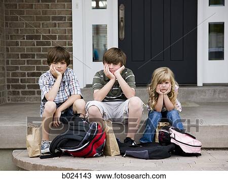children sitting on the front step of their house View Large Photo Image Stock Image - children sitting on the front step of their house. Fotosearch