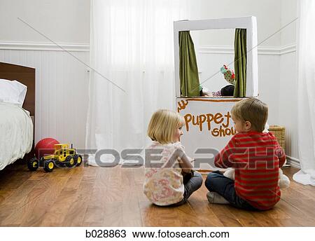 children watching a puppet show View Large Photo Image Stock Image - children watching a puppet show. Fotosearch