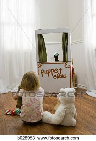 children watching a puppet show View Large Photo Image Stock Image - children watching a puppet show. Fotosearch