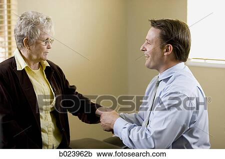 chiropractor treating a patient View Large Photo Image Stock Image - chiropractor treating a patient. Fotosearch