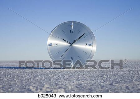 Stock Image - clock in the middle of nowhere. Fotosearch