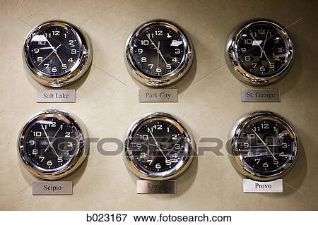 clocks on a wall from different cities in utah View Large Photo Image Stock Photo - clocks on a wall from different cities in utah. Fotosearch