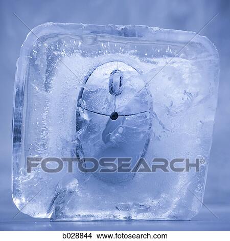 computer mouse frozen in a block of ice View Large Photo Image Picture - computer mouse frozen in a block of ice. Fotosearch